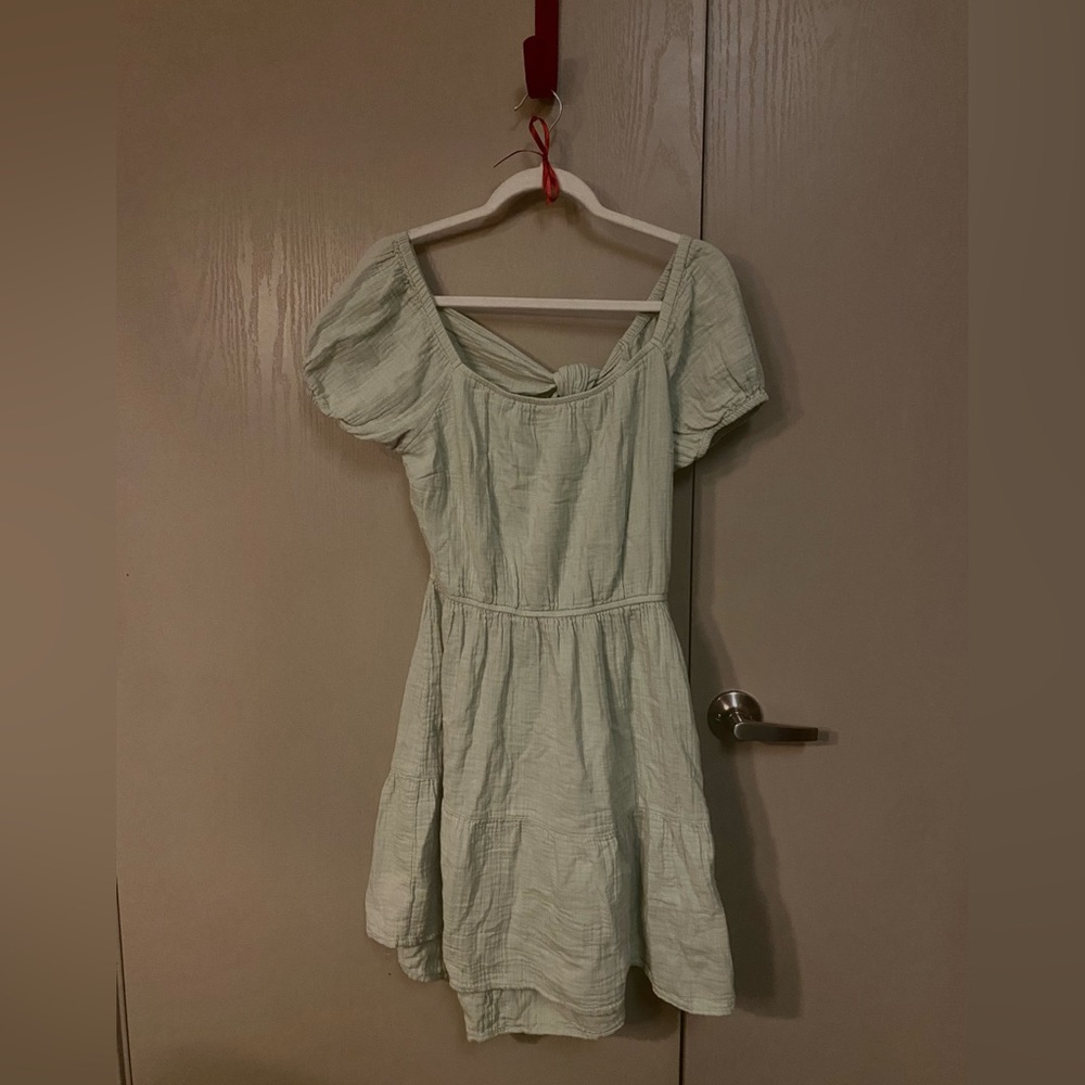 Mint dress. Open back that needs to be tied.